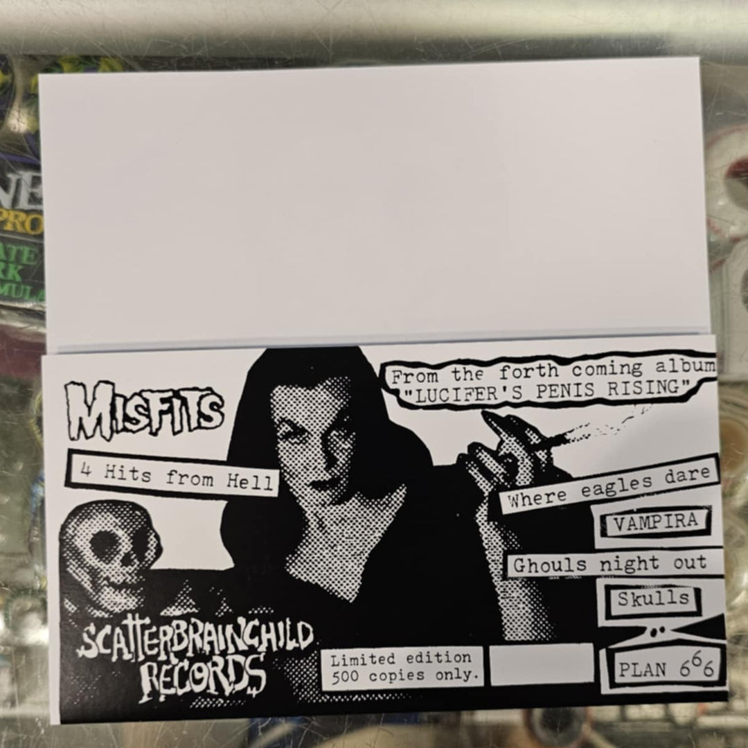 7" Vinyl Record of a women holding a skull text on a reflective surface.