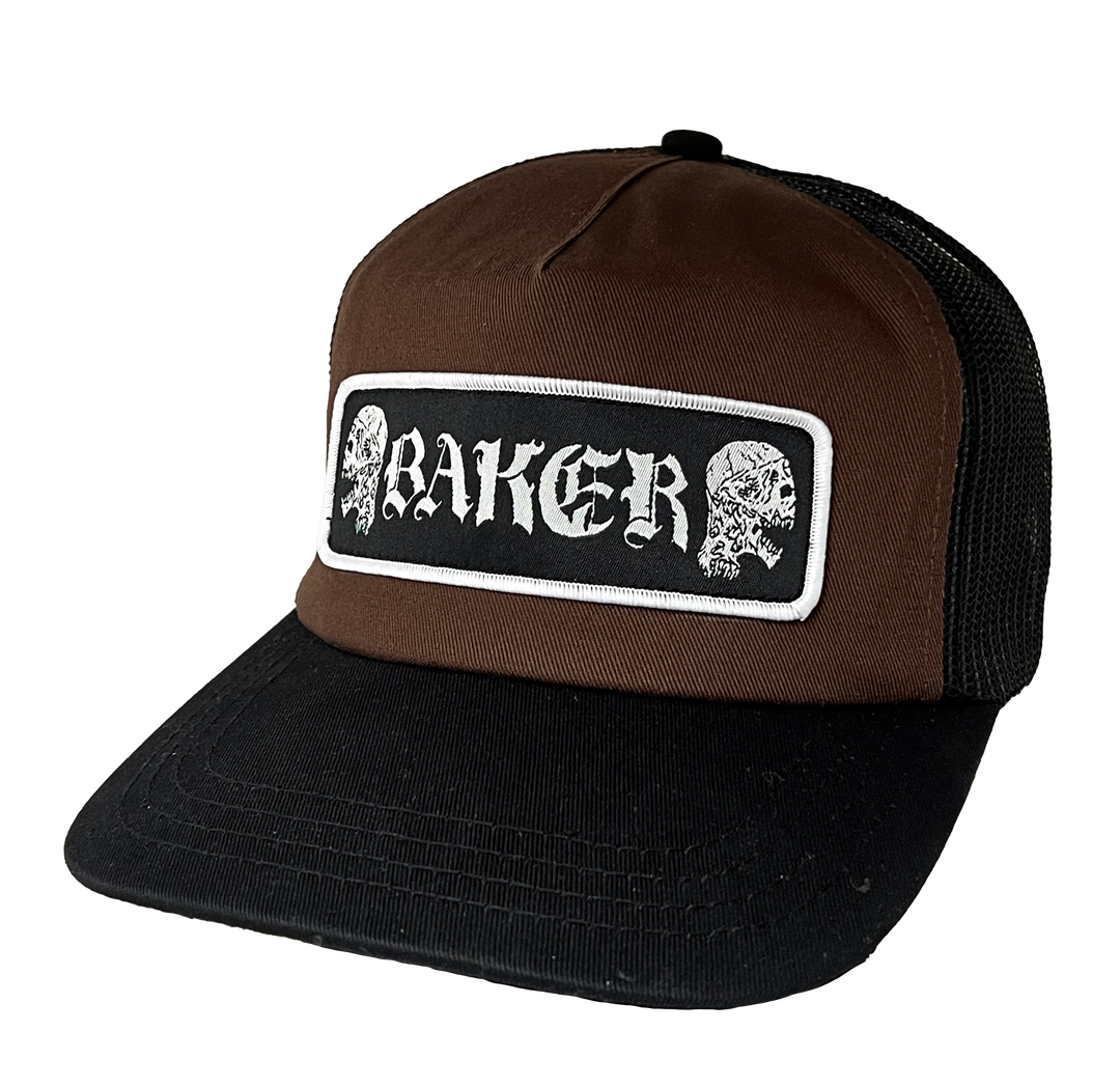 Baker Twin Skulls trucker hat with a brown front, black brim and black mesh