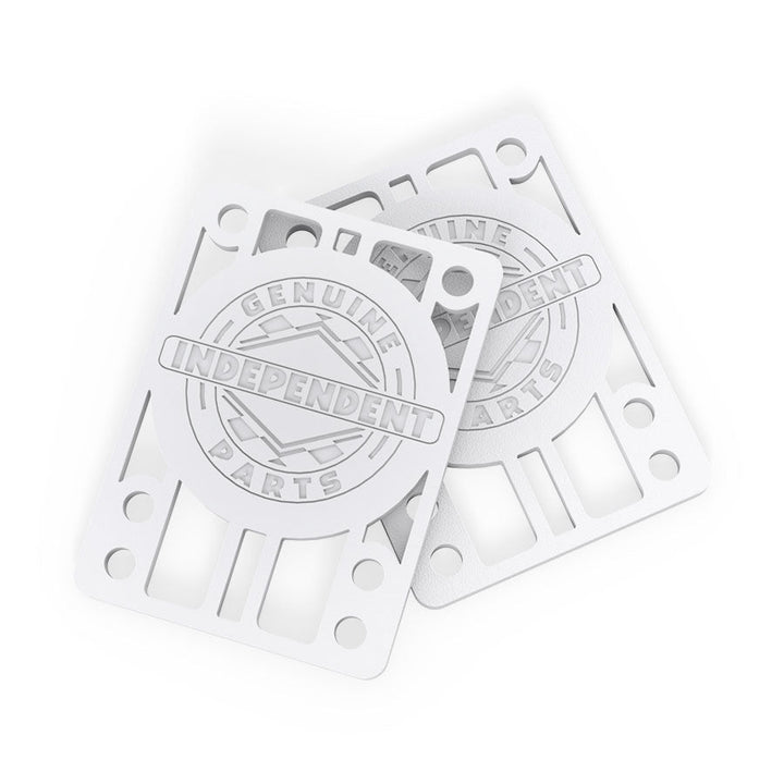 Two white Independent Genuine Parts 1/8-inch riser pads shown overlapping to display the cutout design