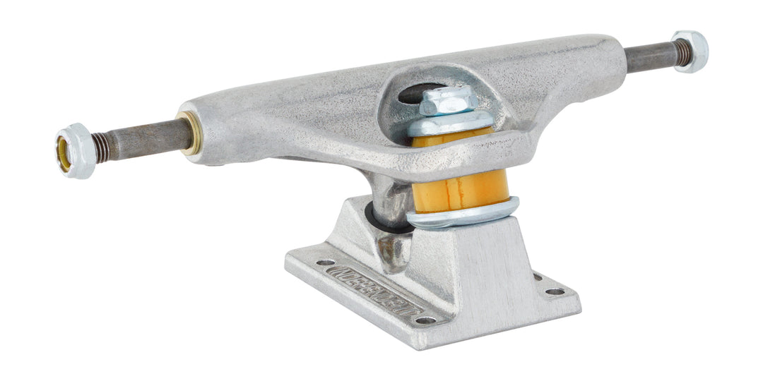 Rear three-quarter view of an Independent Legacy Truck Co Stage 11 truck showing orange bushings, kingpin and baseplate.