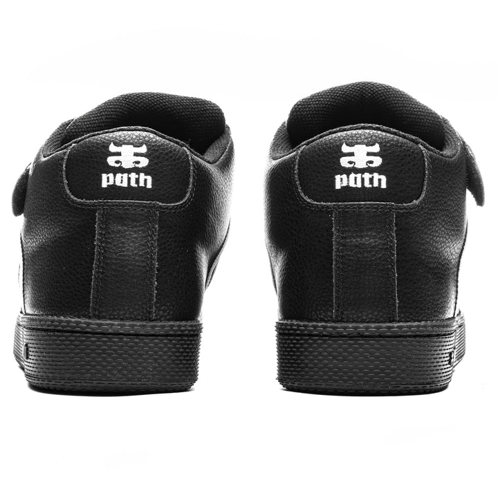 Straight rear view of iPath Grasshopper Black Pebble Leather shoes showing heel stitching and white logos