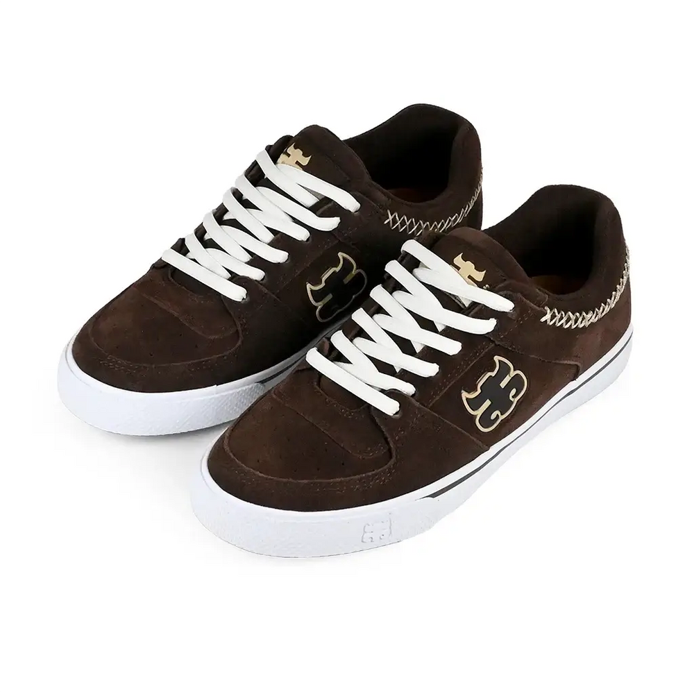 Front three-quarter view of a pair of iPath Reed Low Brown Suede shoes with white laces, cream collar stitching and white soles