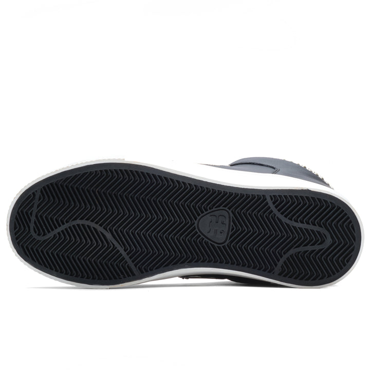 Bottom view of the iPath Reed Mid black leather shoe, showing the black herringbone outsole.
