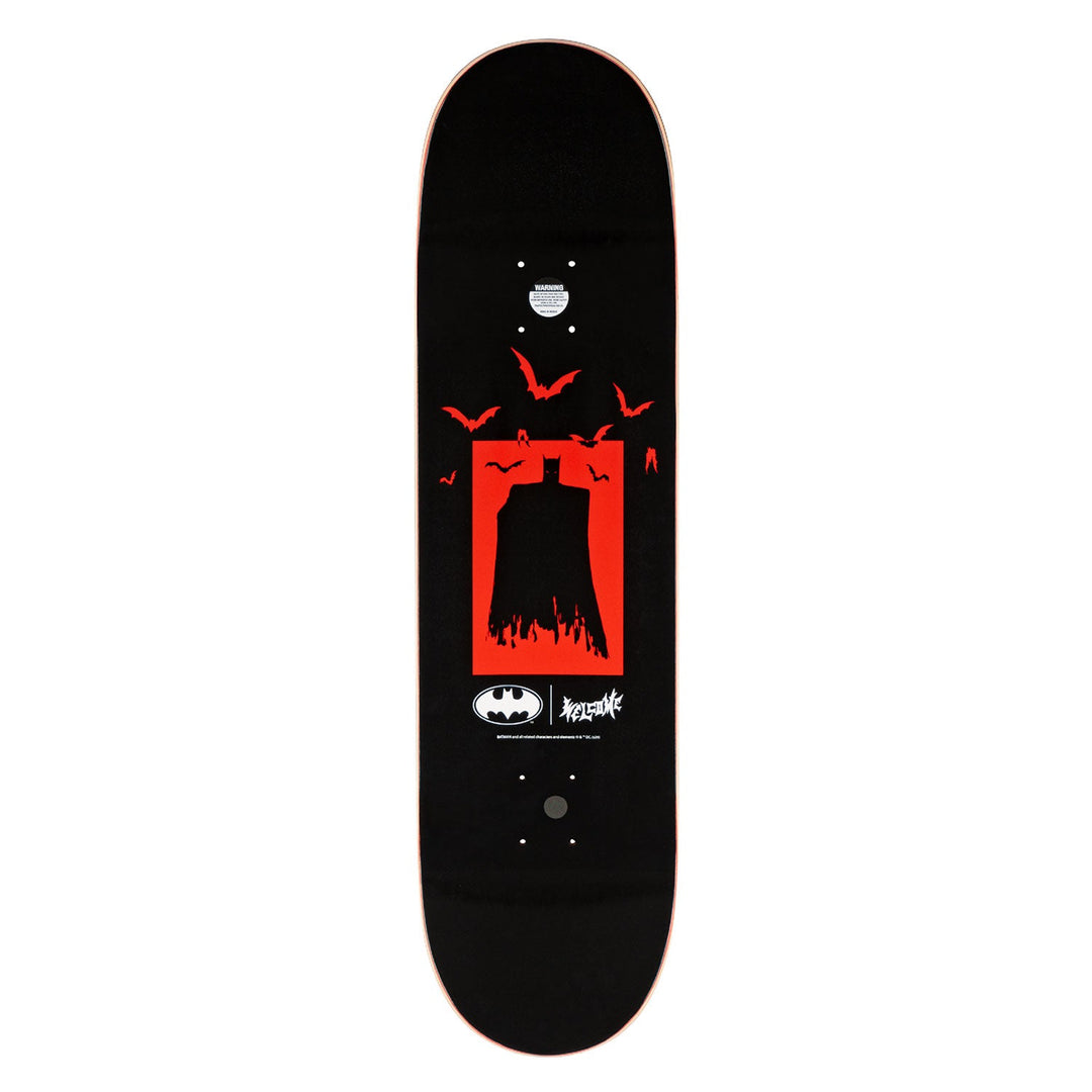 Skateboard deck with red and black design on a white background