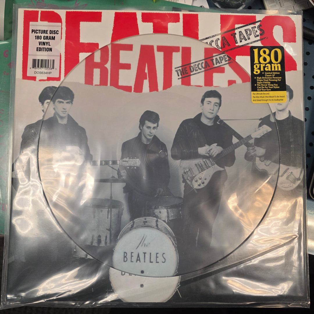 Vinyl record in clear packaging with The Beatles cover