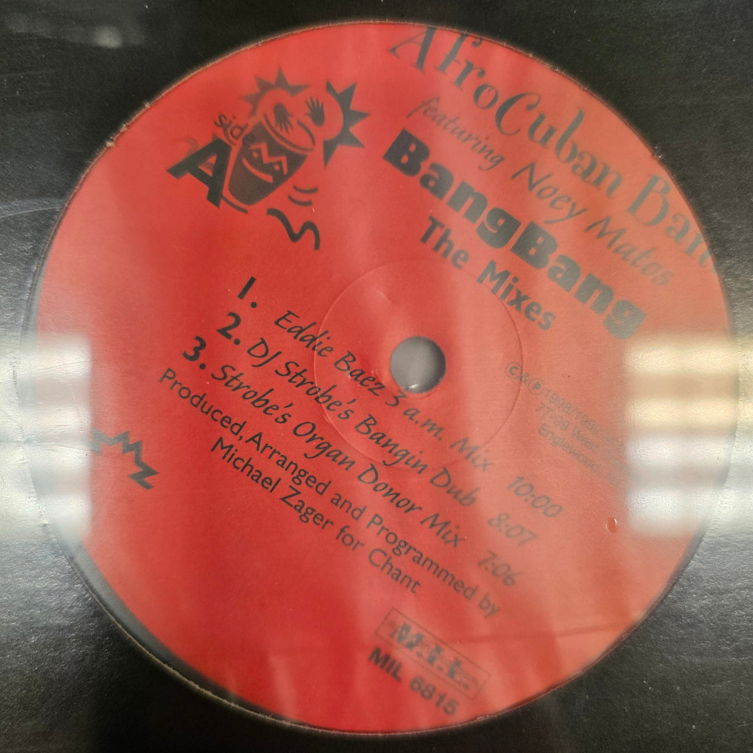 Close-up of a vinyl record label with text and branding.