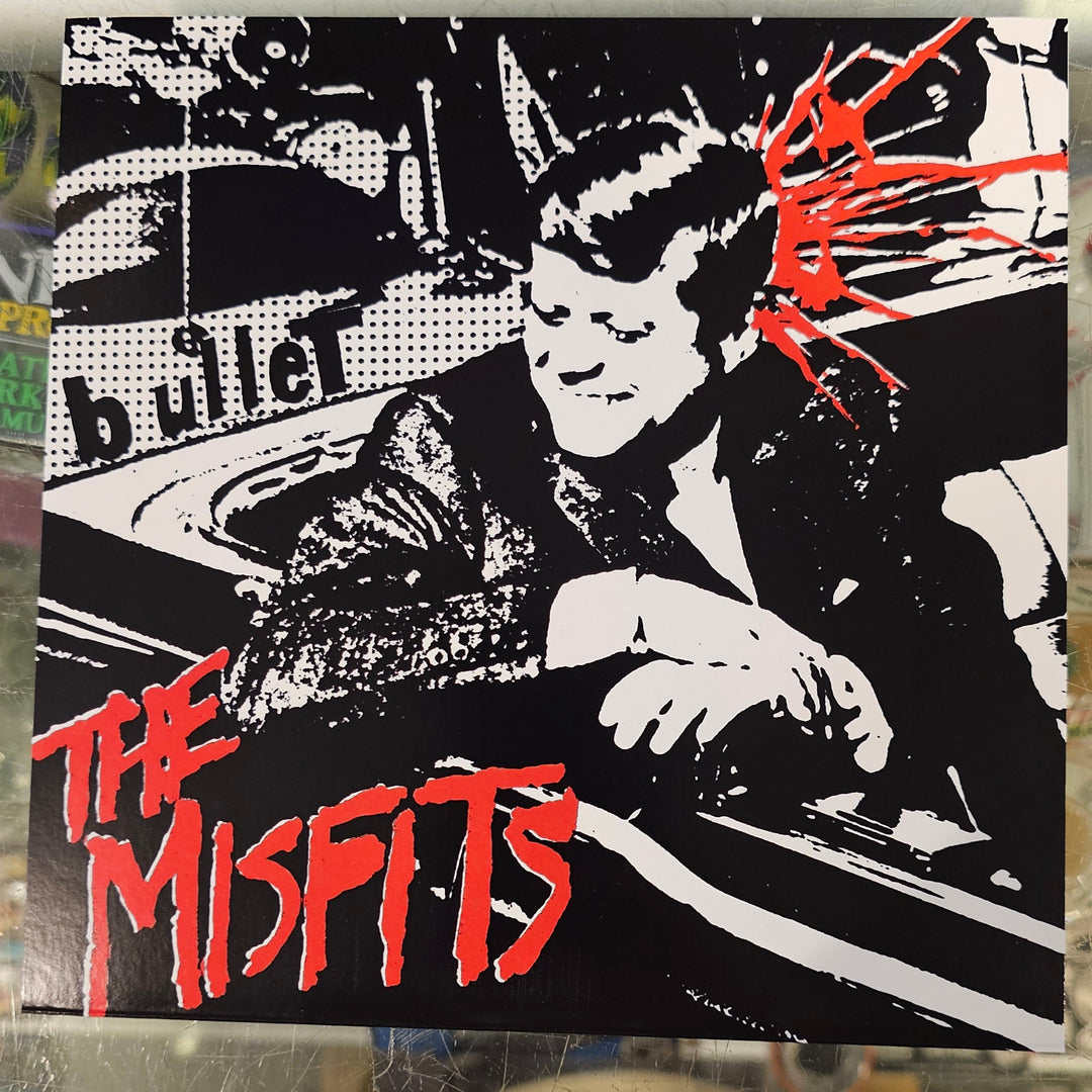7" Album cover for 'The Misfits' with graphic design and text.