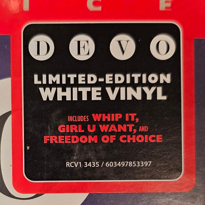Red and black label on a vinyl record with text